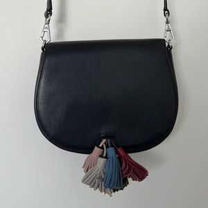 Leather crossbody bag with tassel detail